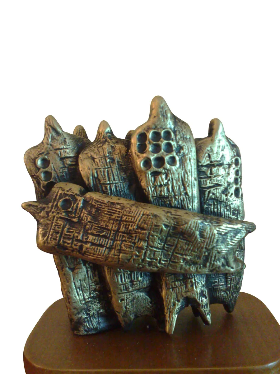 Bronze A10, 2007–2008. Bronze. Bronze with blue-green patina of tall, pierced figures carrying a long incised panel, on a wooden base.