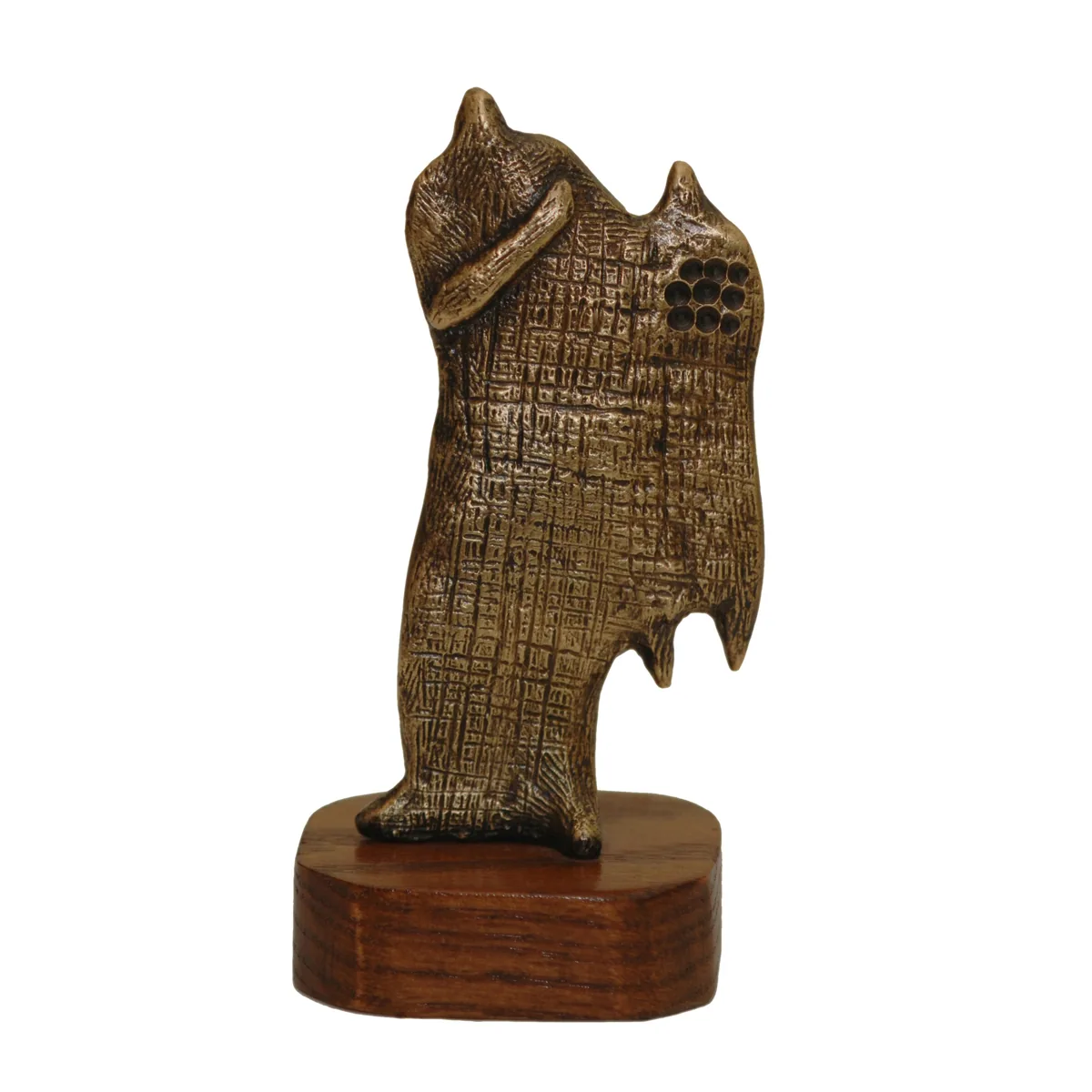 Bronze B12, 2009–2010. Bronze. Bronze of a textured, cloak-like figure with a small pierced head, on a wooden base.