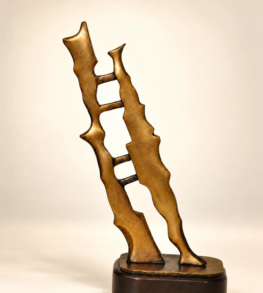 Two Paths, One Journey, 2009. Bronze, wood base. Bronze of a ladder leaning at an angle, rising from a dark base.